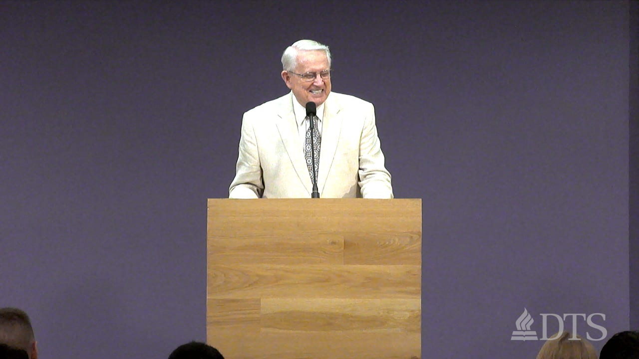 Dr. Chuck Swindoll standing at podium speaking at DTS Chapel