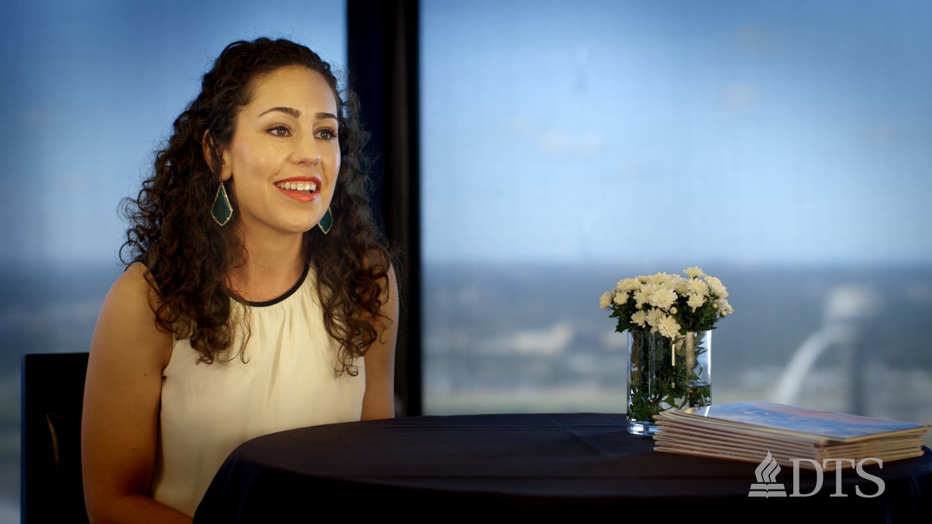 DTS alum Kat Armstrong seated at table