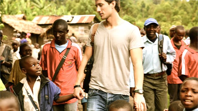 DTS alum Matthew Williams walking with former child soldiers