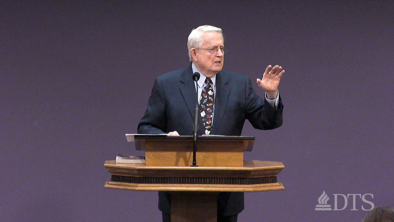 Dr. Chuck Swindoll standing at podium speaking at DTS Chapel