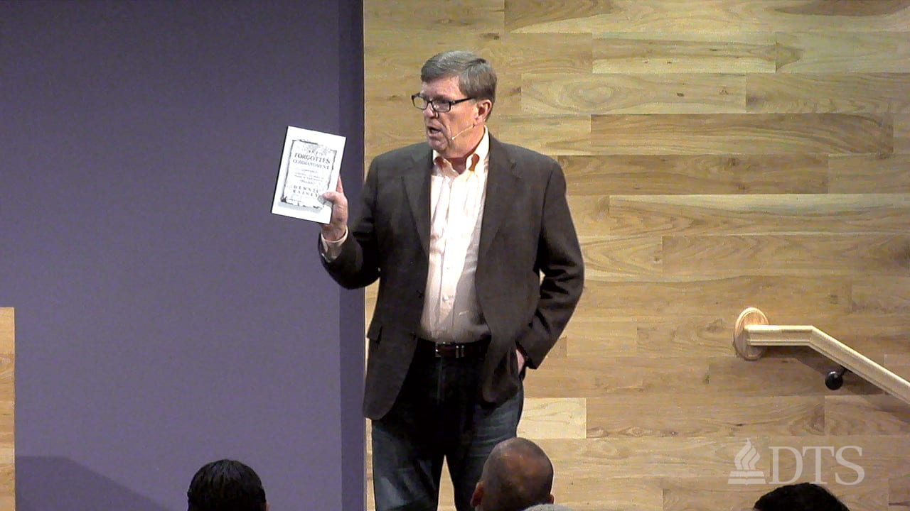 man standing on stage while speaking at DTS Chapel