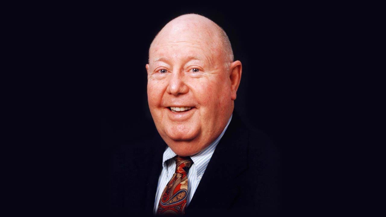 Walt Baker smiling and looking at the camera