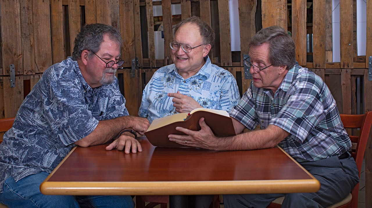 DTS graduates viewing the printed and published NET Bible