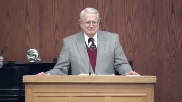 Dr. Chuck Swindoll standing at podium speaking at DTS Chapel