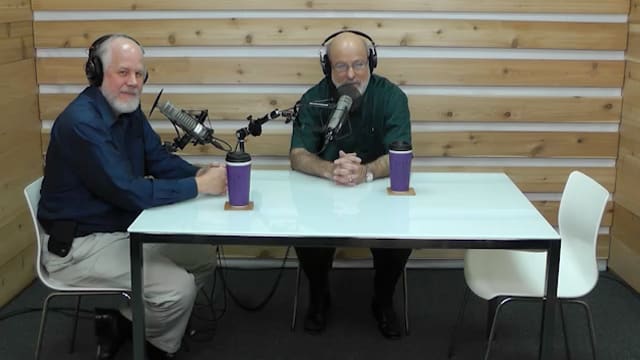Dr. Bock and Reg Grant recording The Table podcast
