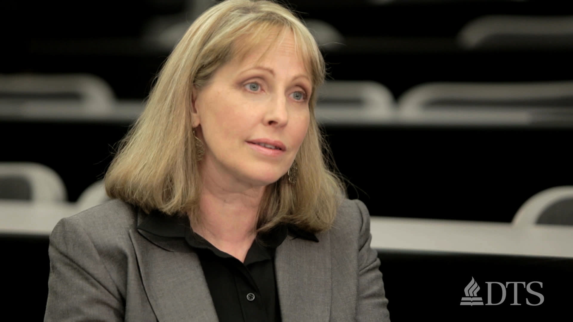 Dr. Sandra Glahn seated in DTS classroom