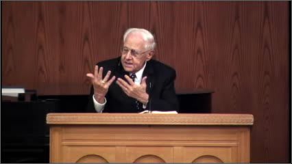 man standing at podium speaking at DTS Chapel
