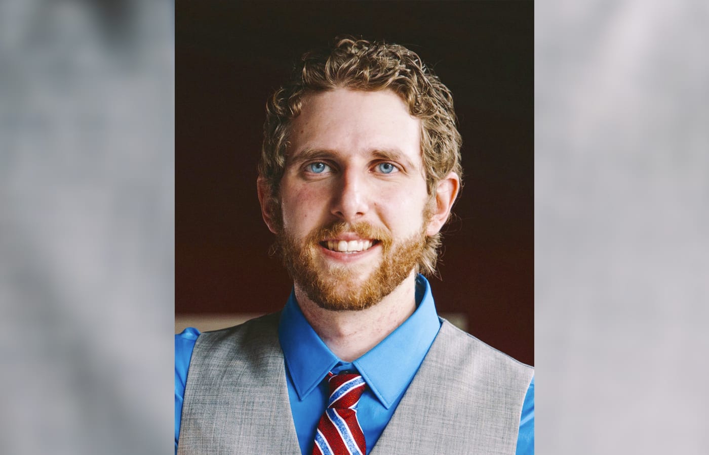 Kevin Gottlieb smiling and looking at the camera