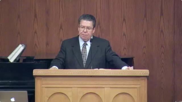 Dr. Mark Bailey standing at podium speaking at DTS Chapel