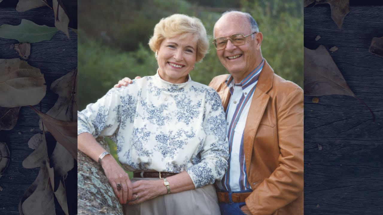 Professor Hendricks standing outside with his wife, Jeanne