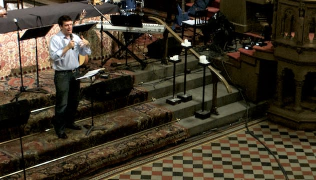 DTS alum JR Vassar speaking in a church