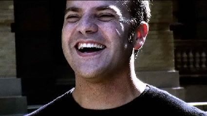 Ben Stuart smiling at someone out of view