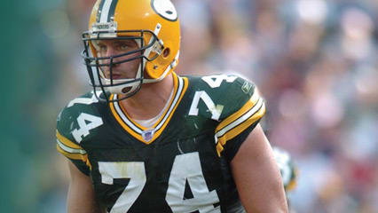 DTS student Aaron Kampman playing football for the Green Bay Packers