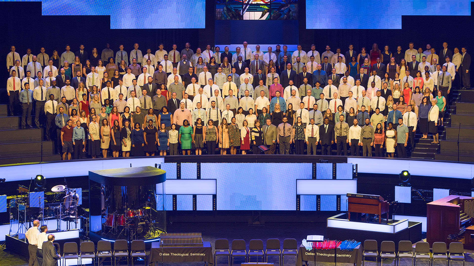 Graduates standing in Prestonwood Choir Loft prior to commencement