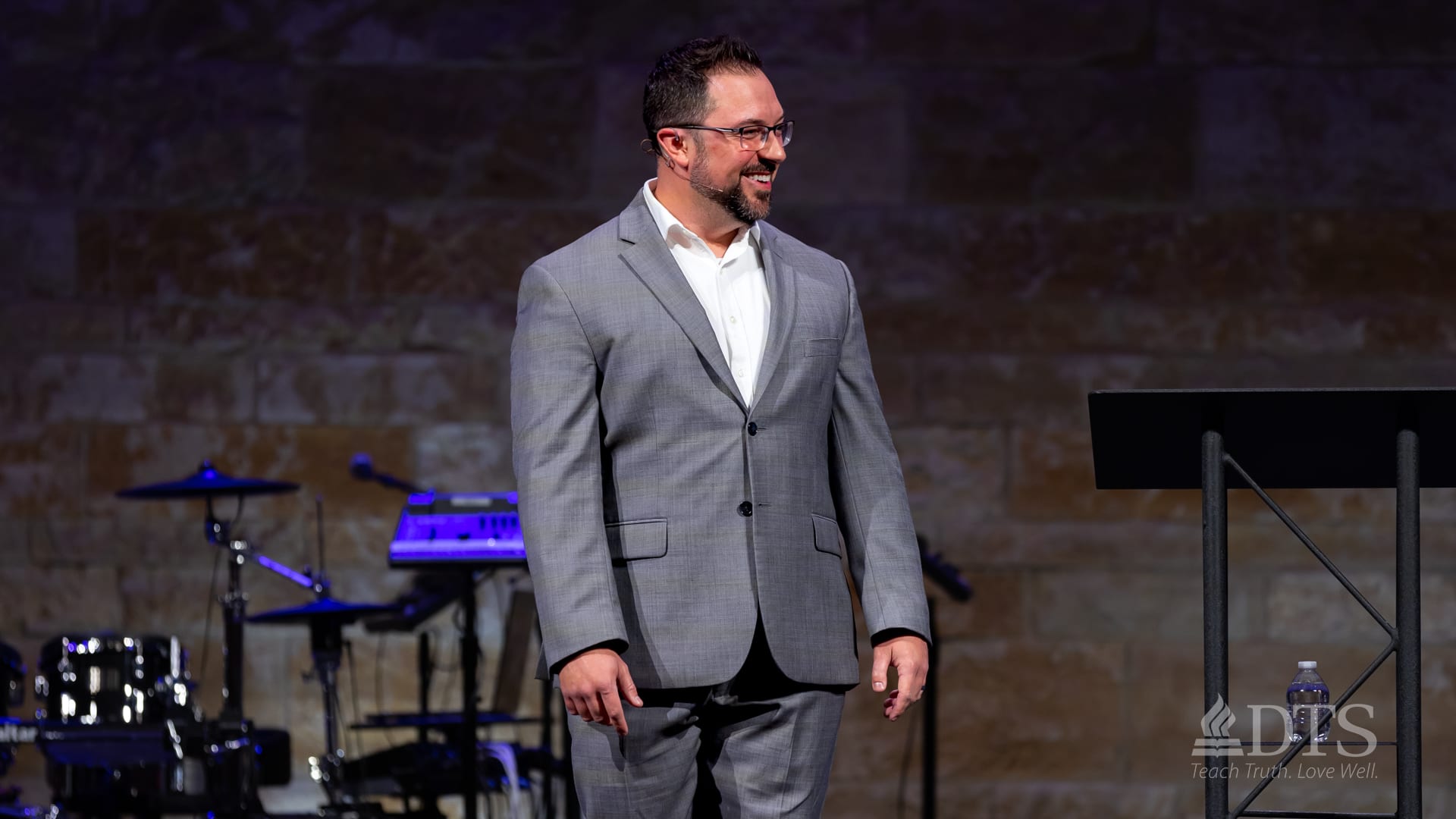 Mace Perez on stage of Dallas Seminary chapel