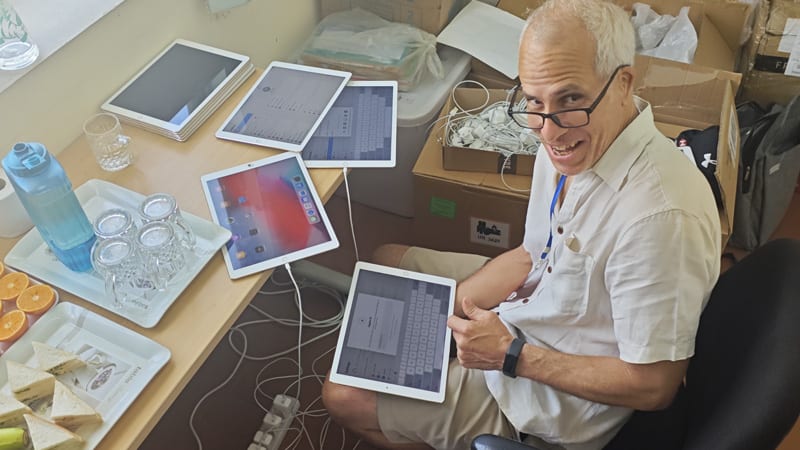 Mateo Solares preparing iPads