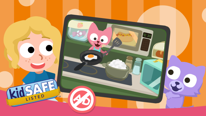 Happy kid using Studycat language app with no ads design