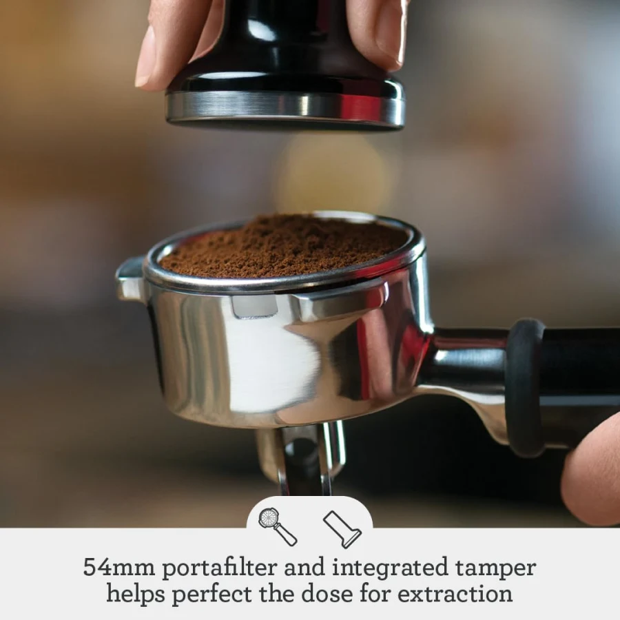 Breville Barista Touch portafilter and group head showing espresso extraction