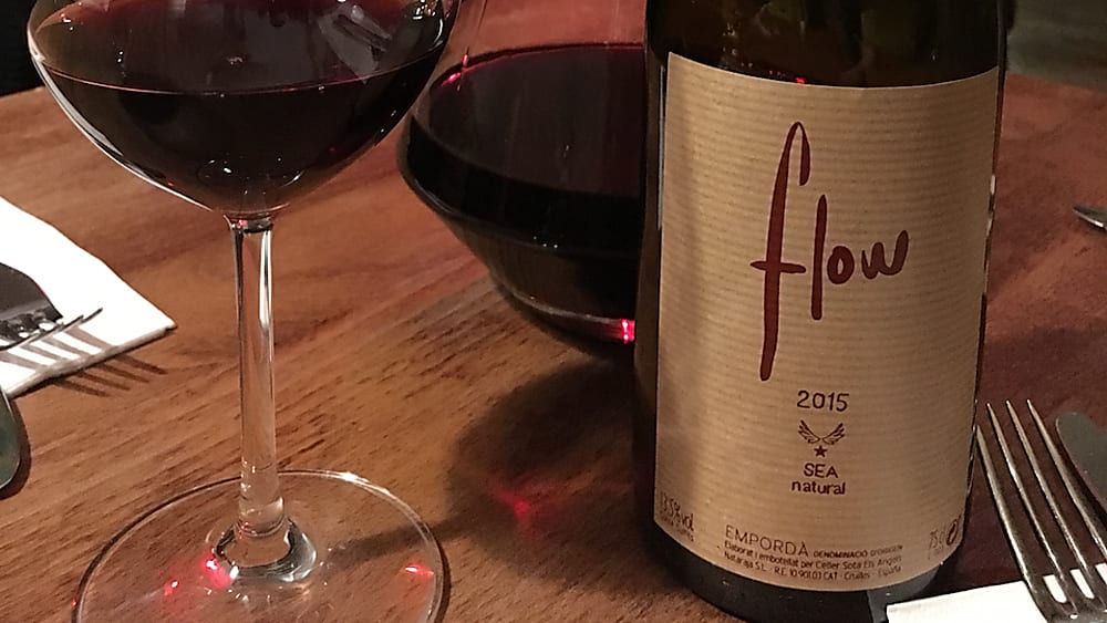 a bottle of Carignan wine and a glass a bottle of Carignan wine and a glass