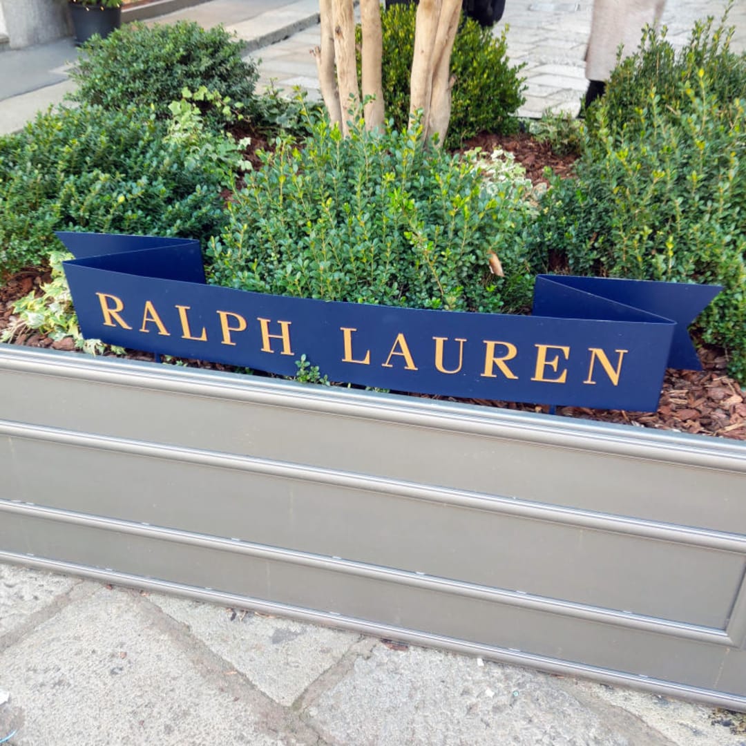 Tarif Impor 25% Pada China Tantang Ralph Lauren Kelola Produksi dan Harga