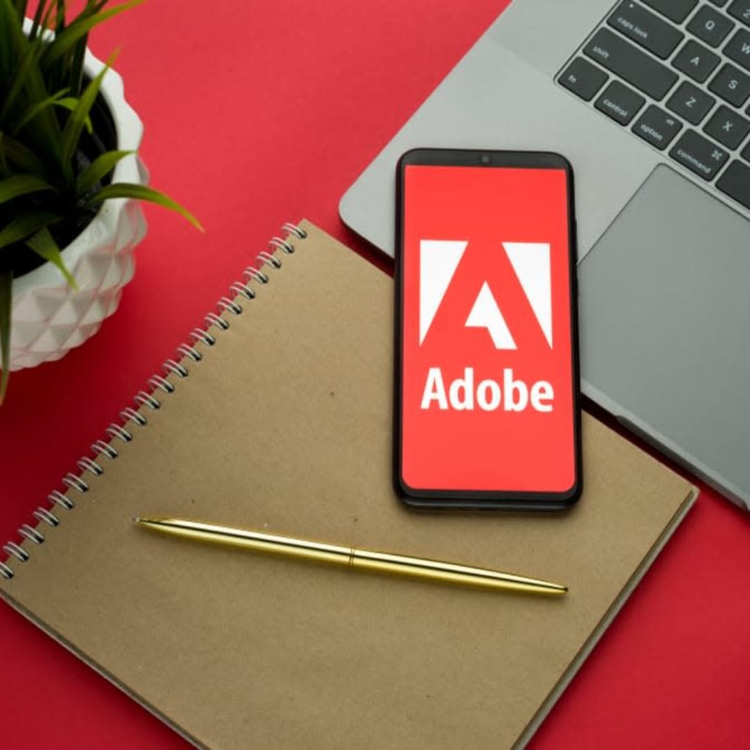 Mengapa Saham Adobe Turun Meski Bisnis dan AI Makin Kuat?