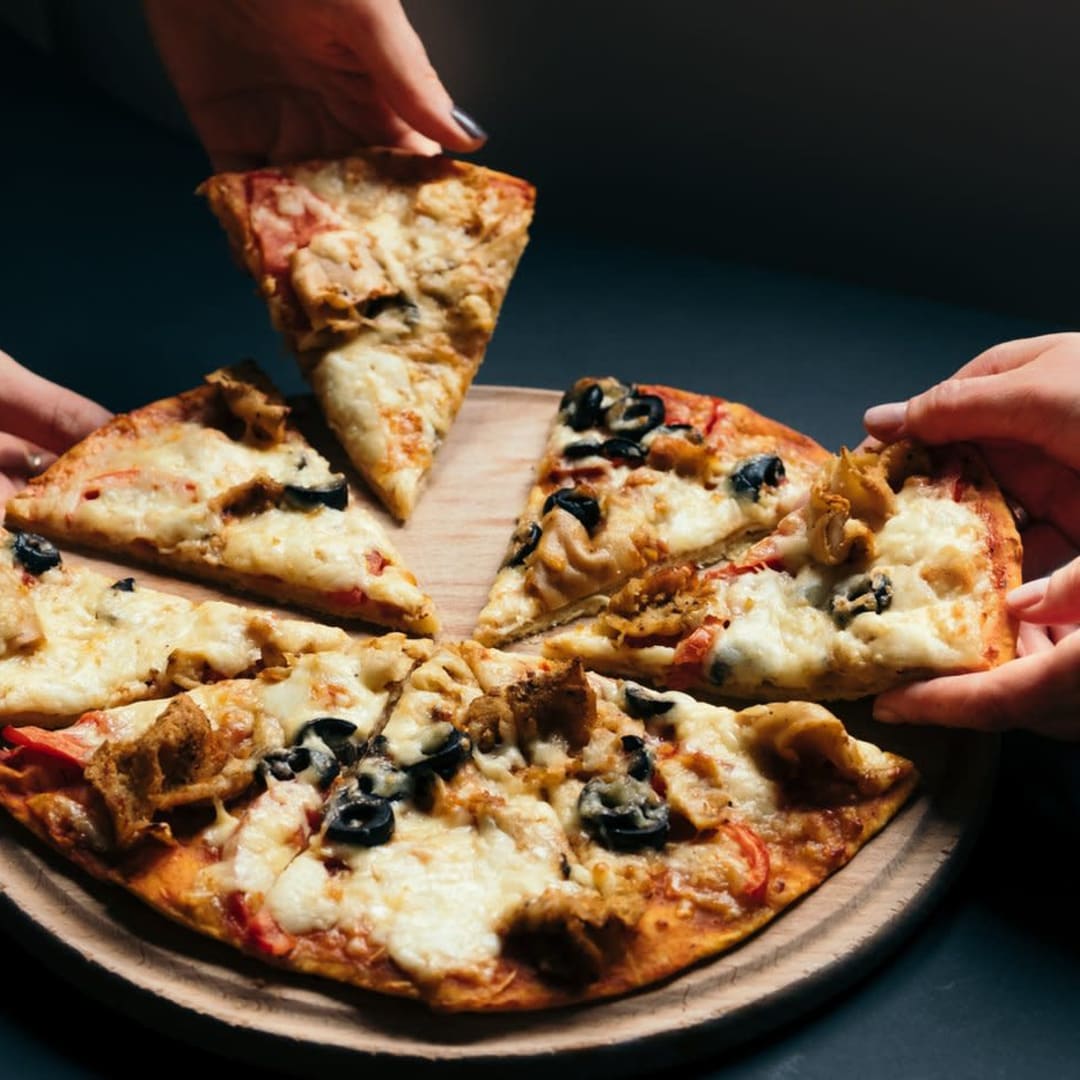 Rahasia Sukses Domino's Pizza: Bisnis Waralaba dan Pengembalian Modal yang Hebat