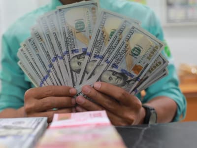 Rupiah Menguat Tipis, Pasar Tunggu Kebijakan BI dan The Fed Pekan Ini