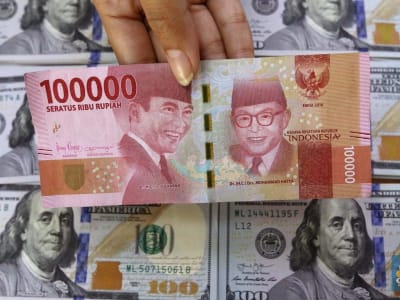 Rupiah Anjlok, BI Diprediksi Menahan Suku Bunga untuk Stabilkan Nilai Tukar