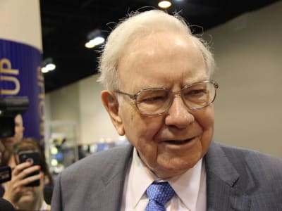 Rahasia Kesuksesan Buffett: Investasi Besar di Saham Dividen Apple dan Coca-Cola