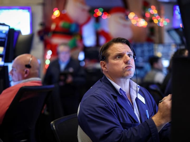 Saham turun setelah Fed memangkas suku bunga seperti yang diharapkan.