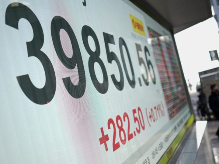 Pasar saham hari ini: Saham Asia bervariasi karena China melaporkan laba industri yang lebih rendah.