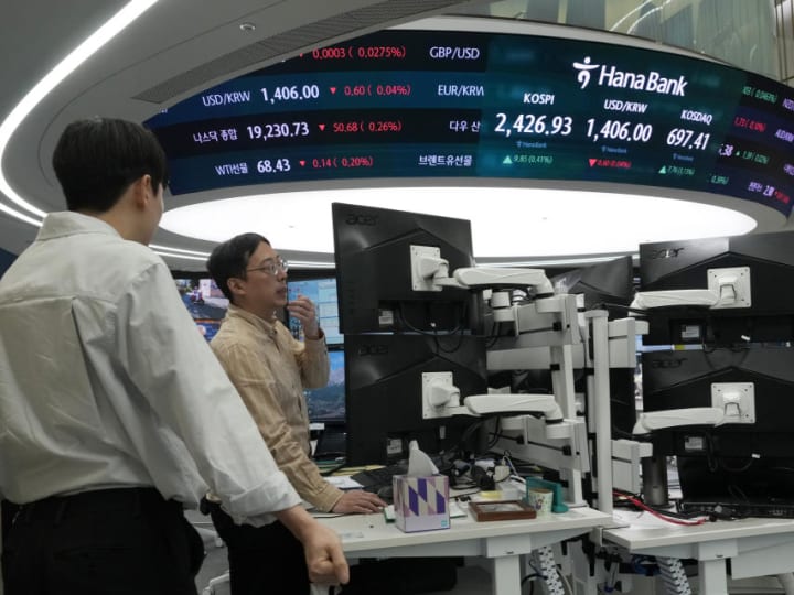 Pasar saham hari ini: Saham Asia bergerak bervariasi, mengikuti penutupan campuran Wall Street saat dolar menguat.