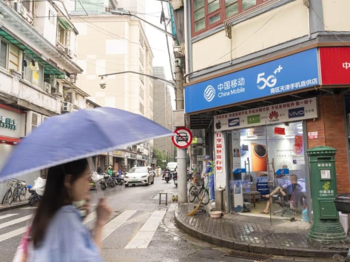 China Mobile Dilaporkan Mempertimbangkan Kesepakatan untuk Penyedia Internet HKBN