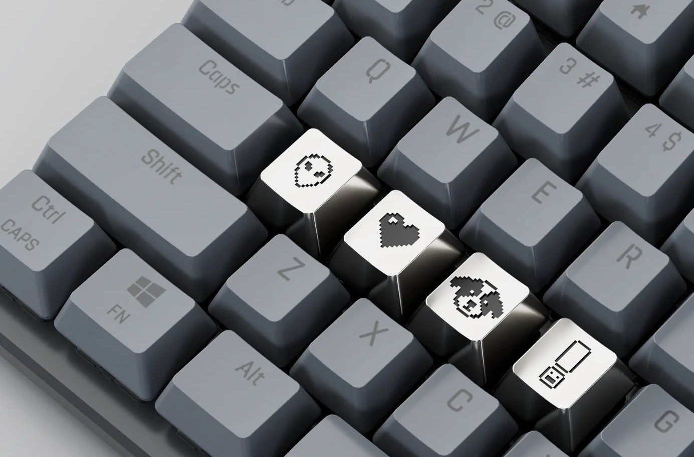 Susan Kare Luncurkan Koleksi Ikon Gadget Retro Dalam Bentuk Liontin dan Keycaps