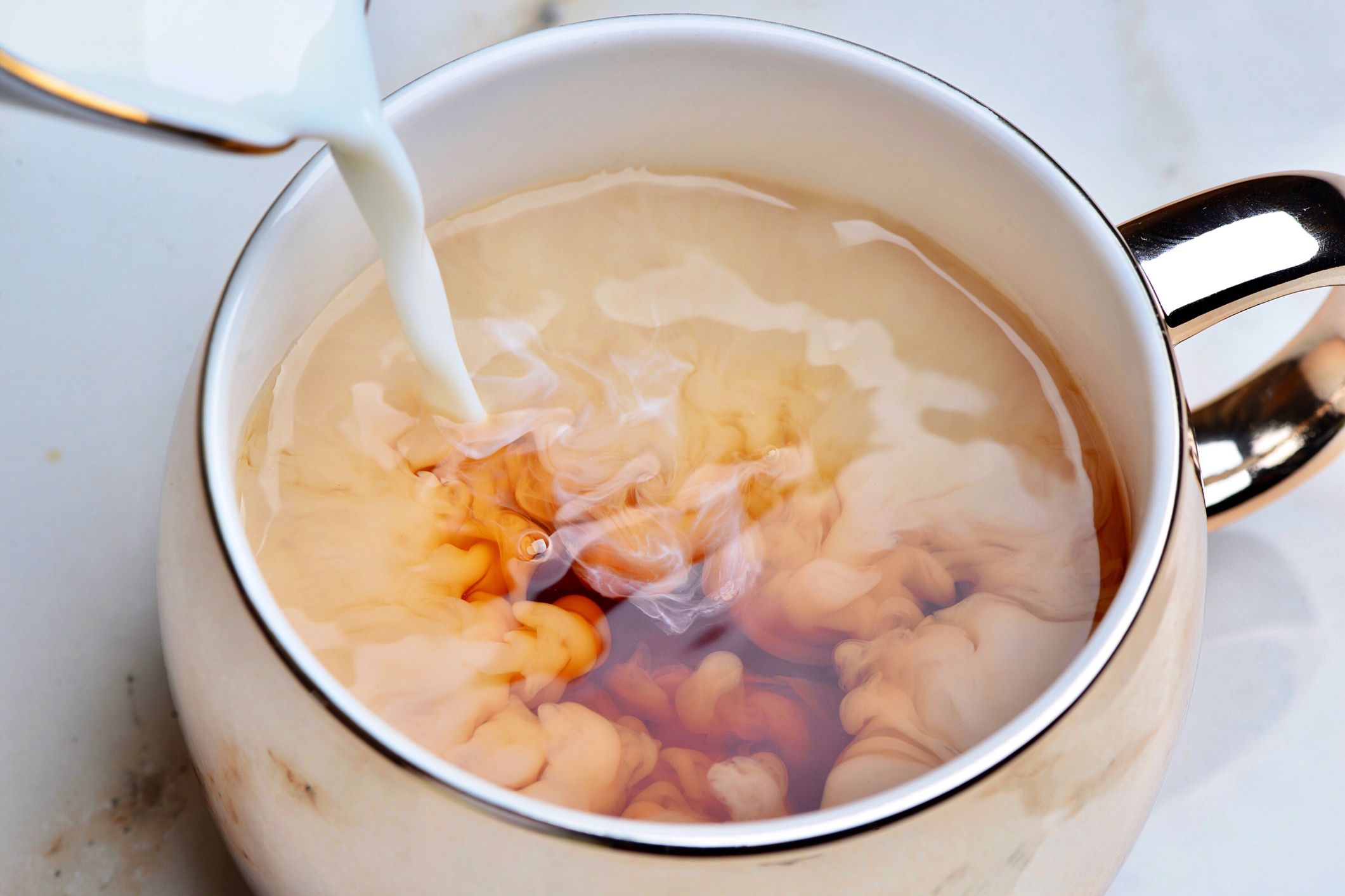 Rahasia Teh dan Susu: Bagaimana Fisher Mengubah Cara Kita Memahami Statistik