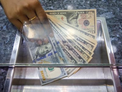 Dolar AS Menguat Tajam Akibat Ancaman Tarif Dagang Baru Trump