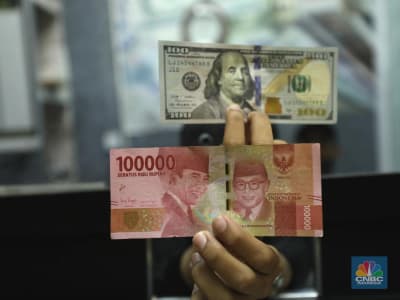 BI Pertahankan Suku Bunga, Rupiah Melemah di Tengah Ketidakpastian Global