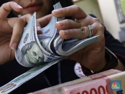 Rupiah Melemah Dipicu Ketidakpastian Kebijakan Perdagangan AS dan Faktor Domestik