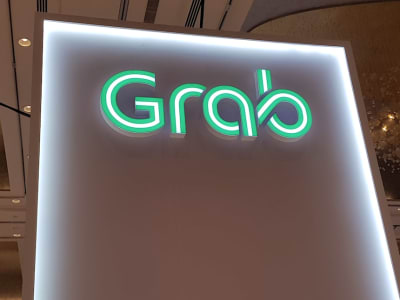 Grab Cari Pinjaman Rp 32.89 triliun ($2 Miliar)  untuk Akuisisi GoTo Meski Hambatan Regulasi