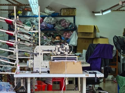 Tarif Tinggi AS Mengancam Pekerja Pabrik Tekstil di Guangzhou