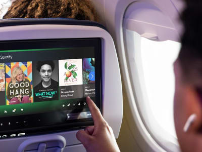 United Airlines Tawarkan Audiobook dan Video Podcast Gratis Lewat Spotify di Pesawat