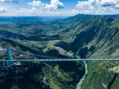 Jembatan Huajiang Grand Canyon: Jembatan Gantung Terpanjang dan Tertinggi Dunia di Guizhou