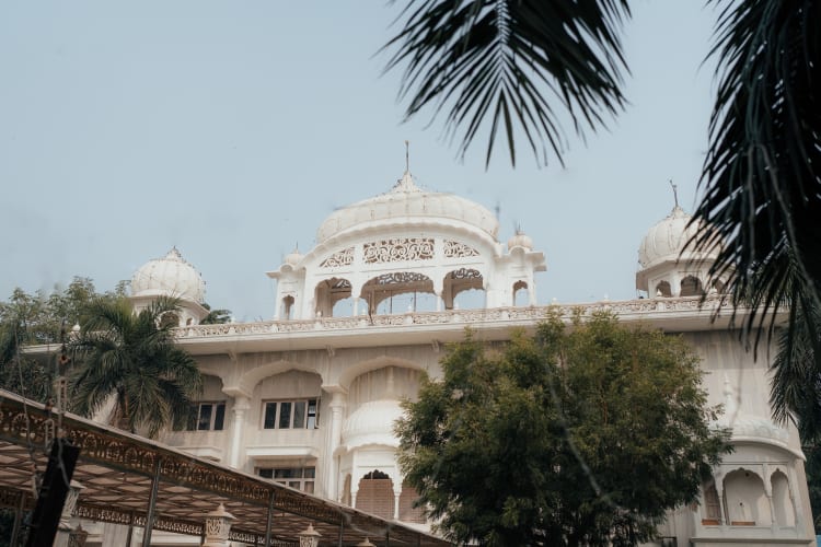 Guests gathered at Sikh wedding reception Gurdwara Pune — candid documentary wedding film by FineShot Weddings