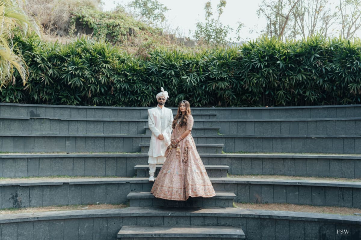 cinematic wedding reception frame in Oxford Golf Club , Pune by FineShot Weddings