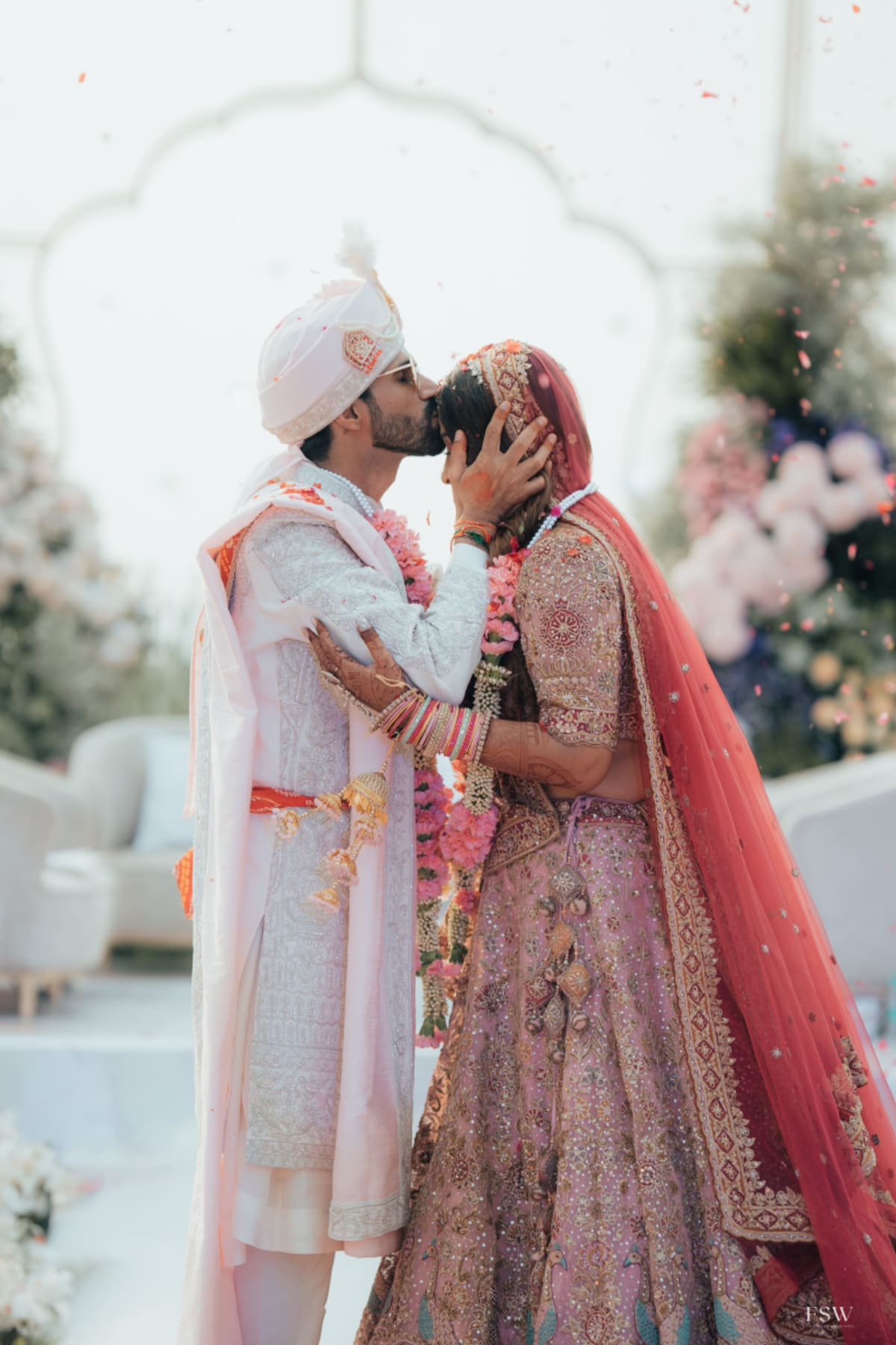 cinematic wedding reception frame in Oxford Golf Club , Pune by FineShot Weddings