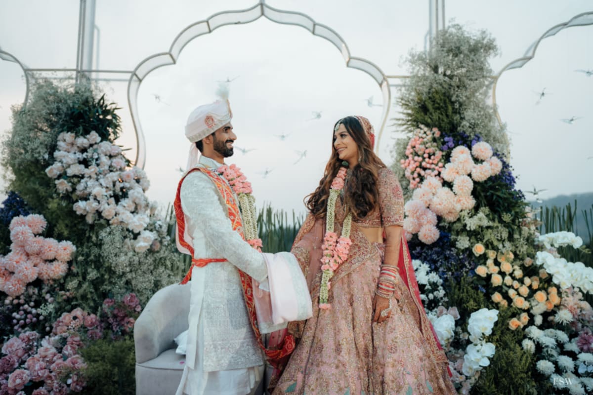 cinematic wedding reception frame in Oxford Golf Club , Pune by FineShot Weddings