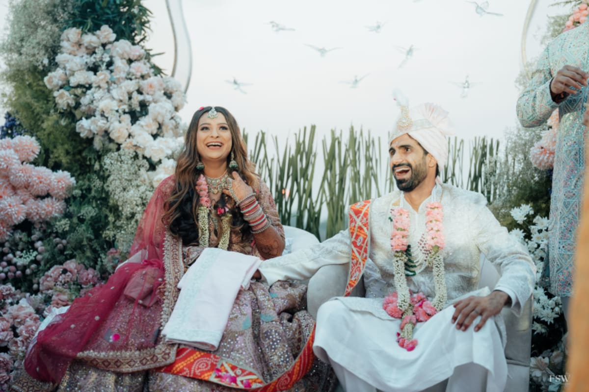cinematic wedding reception frame in Oxford Golf Club , Pune by FineShot Weddings