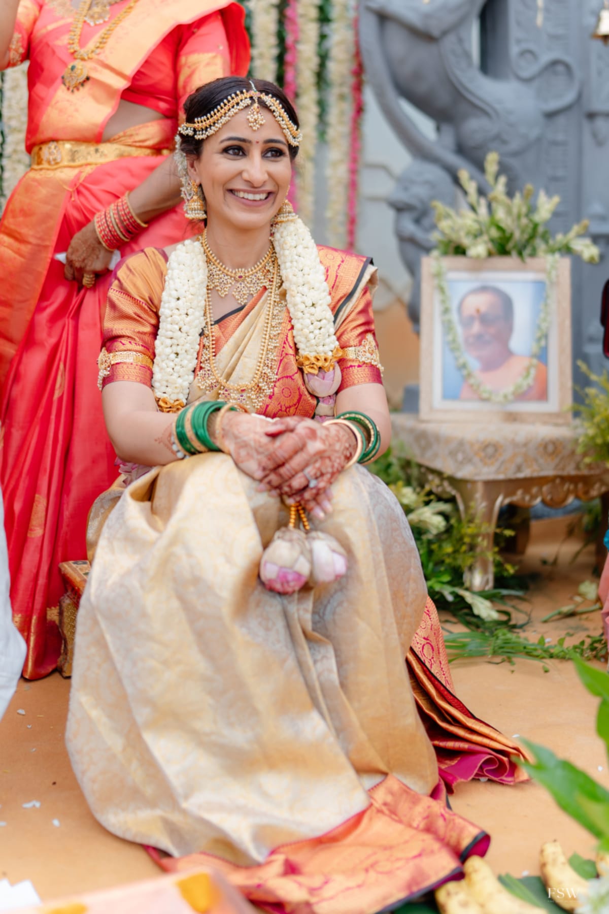 cinematic wedding reception frame in  Taj Krishna ,hyderabad by FineShot Weddings
