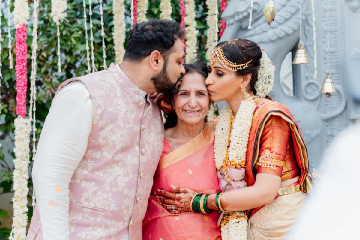 cinematic wedding reception frame in  Taj Krishna ,hyderabad by FineShot Weddings