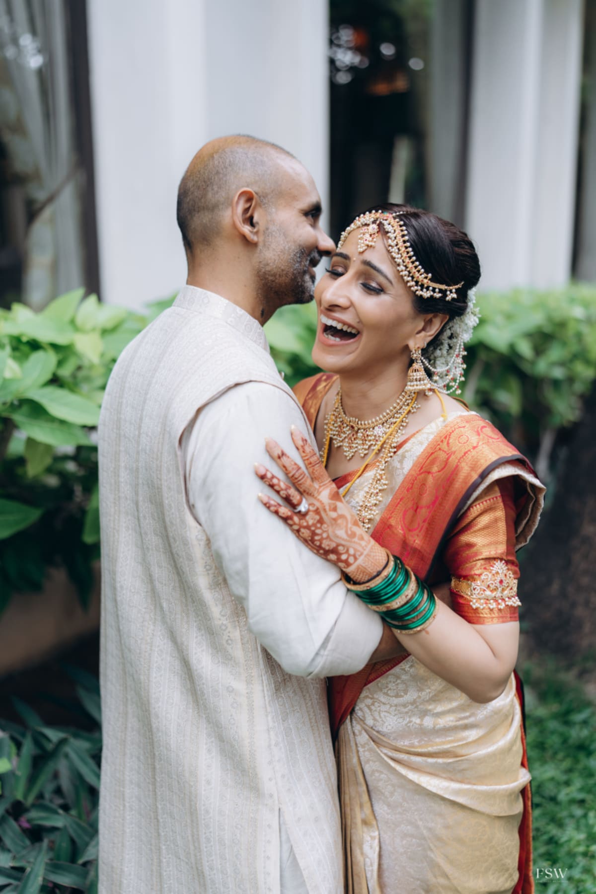 cinematic wedding reception frame in  Taj Krishna ,hyderabad by FineShot Weddings